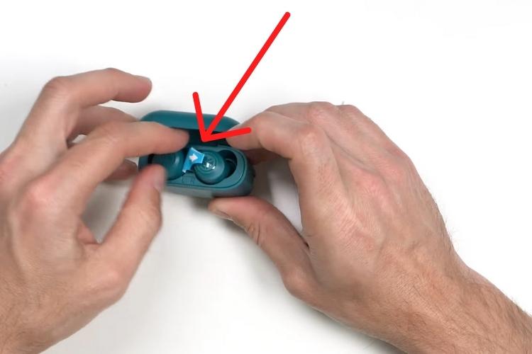 Peel off the protective films from the charging pins